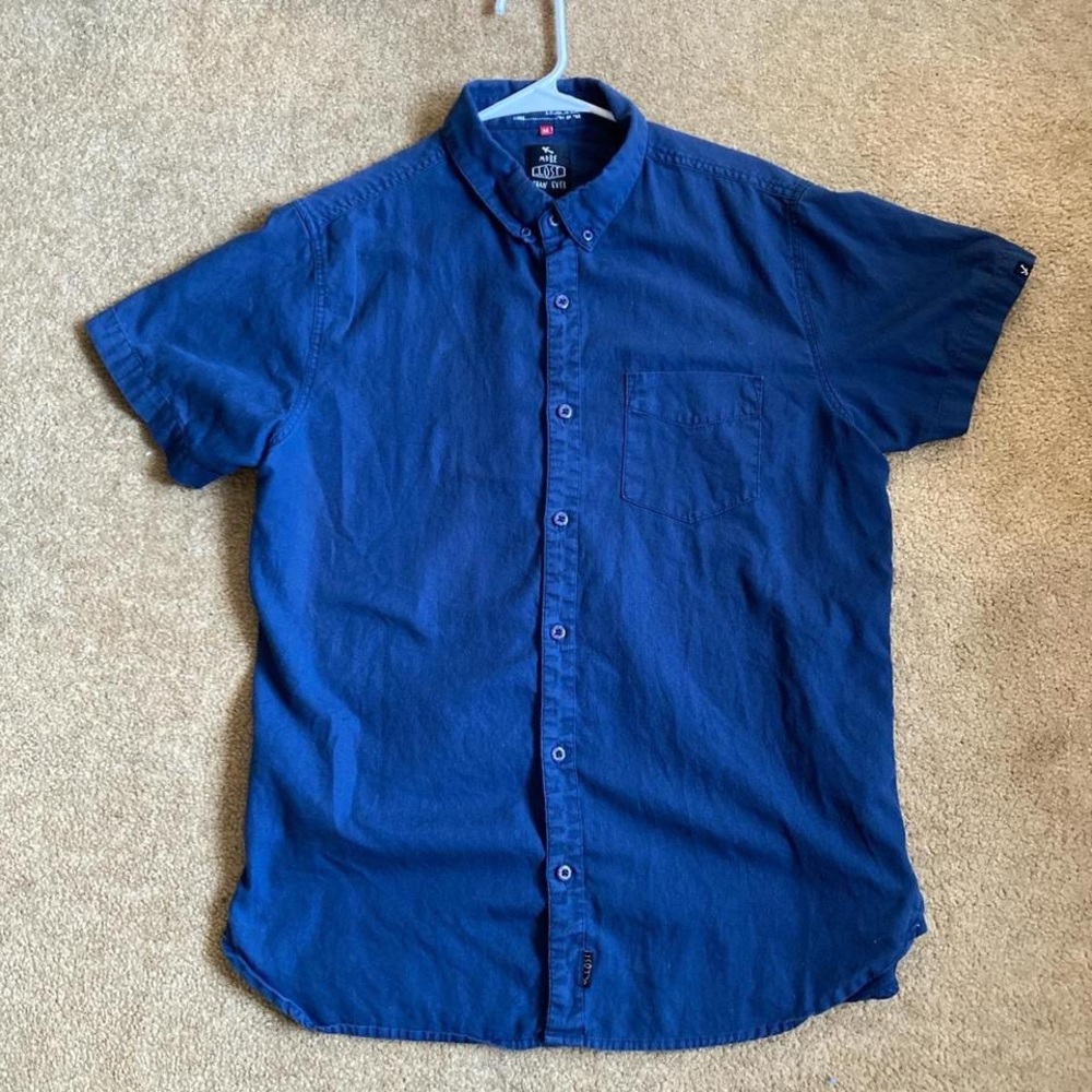 Lost Enterprise, medium buttoned short sleeve.
